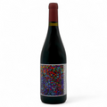 A bottle of Les Garrigues 2023 wine from the Sélection Jean Louis Denois estate
